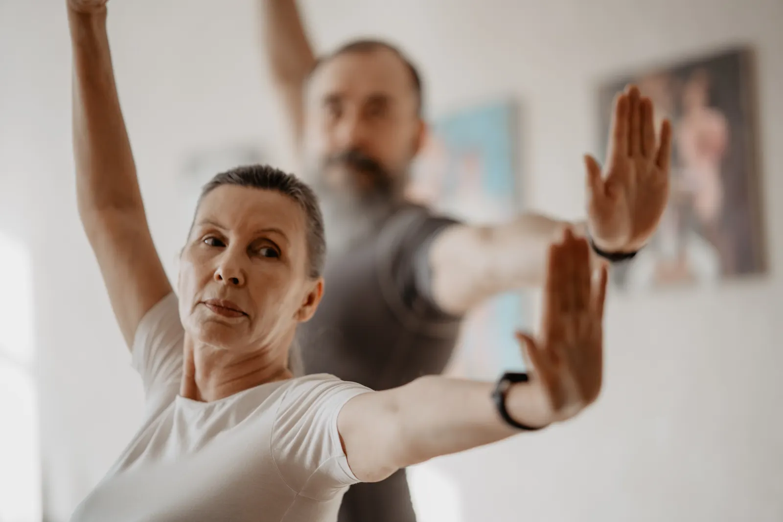 Older adults doing a gentle movement session at home