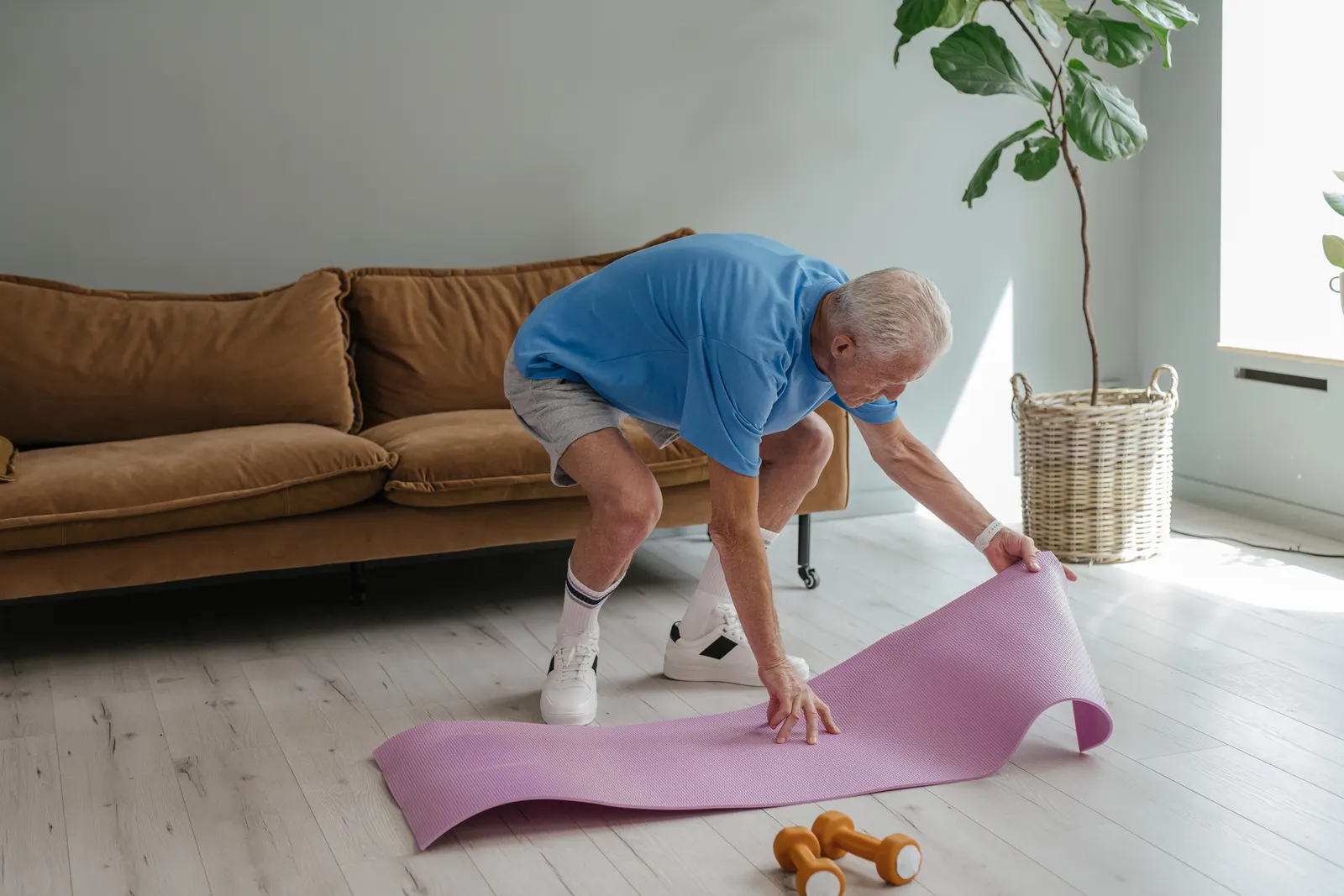 Older man preparing for a calm home exercise routine